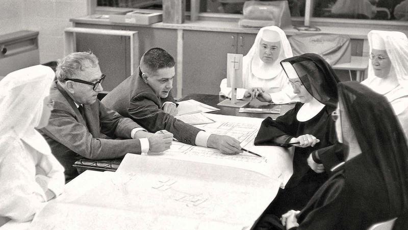  Marcel Breuer reviewing the architectural plans for Mary College with the Sisters.