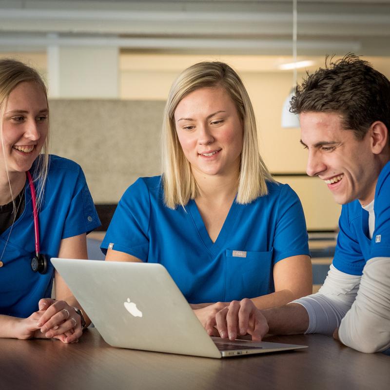 Kelly Danielson working with fellow University of Mary nursing classmates.