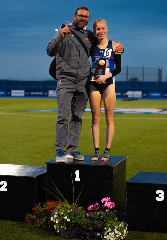 Ida Narbuvoll Celebrates NCAA 10K Championship with Head Coach Dennis Newell