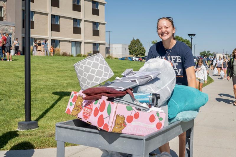 Student moving into their dorm room