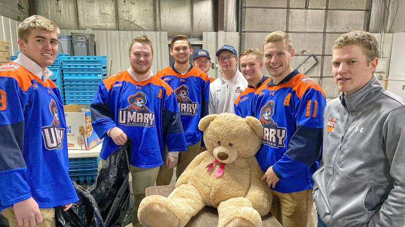 Hockey Team with Large Bear