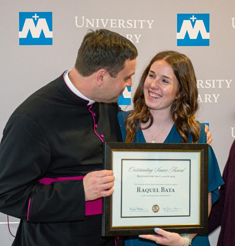 Raquel Bata with Monsignor