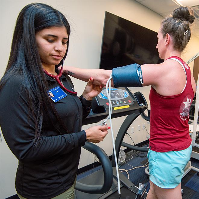 Student checking another students pulse