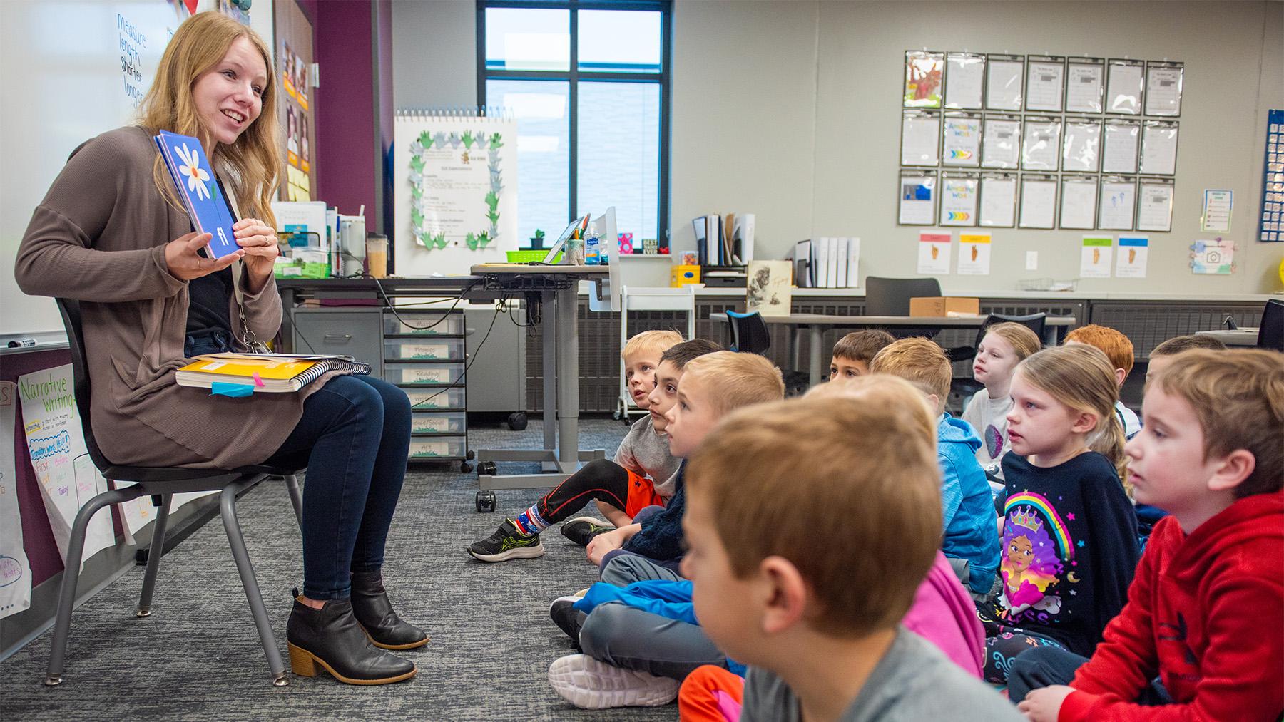 One of our alumni teach a class of second graders.