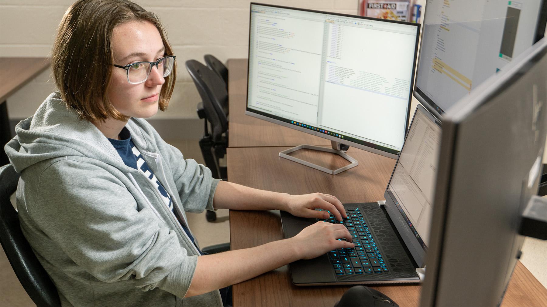 Student working on a coding project