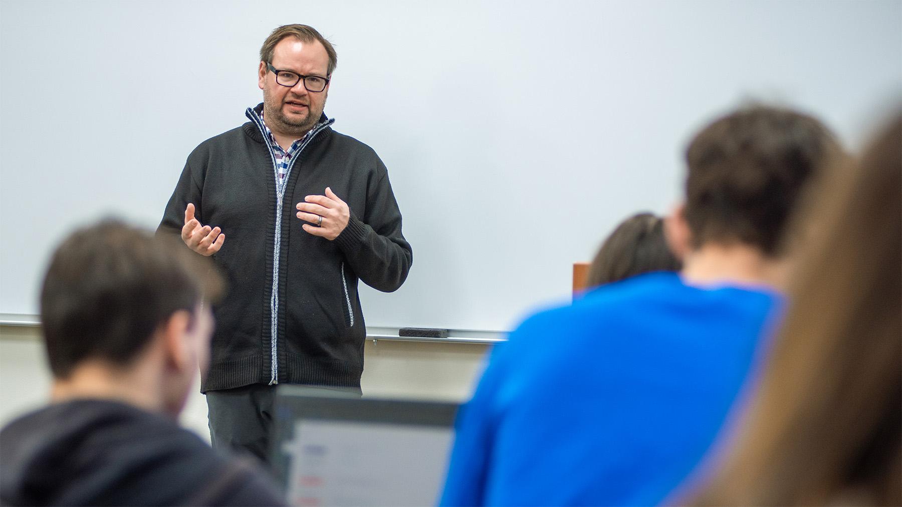 A professor teaching a business class