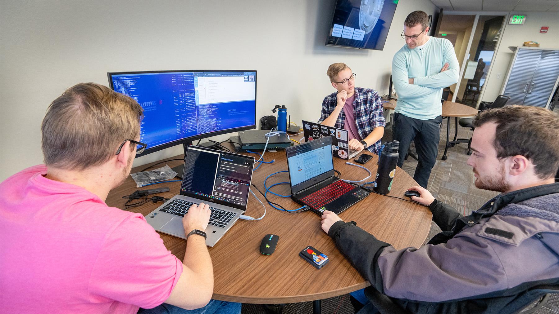 students working on a coding project in class