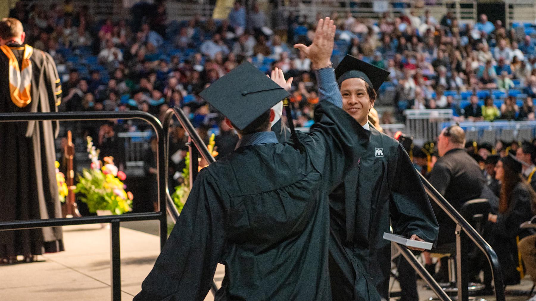 Students celebrating at Graduation
